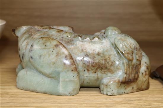 A bowenite carving of a lion-dog, length 21cm
